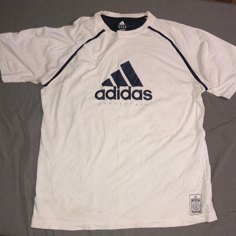 white adidas t-shirt.